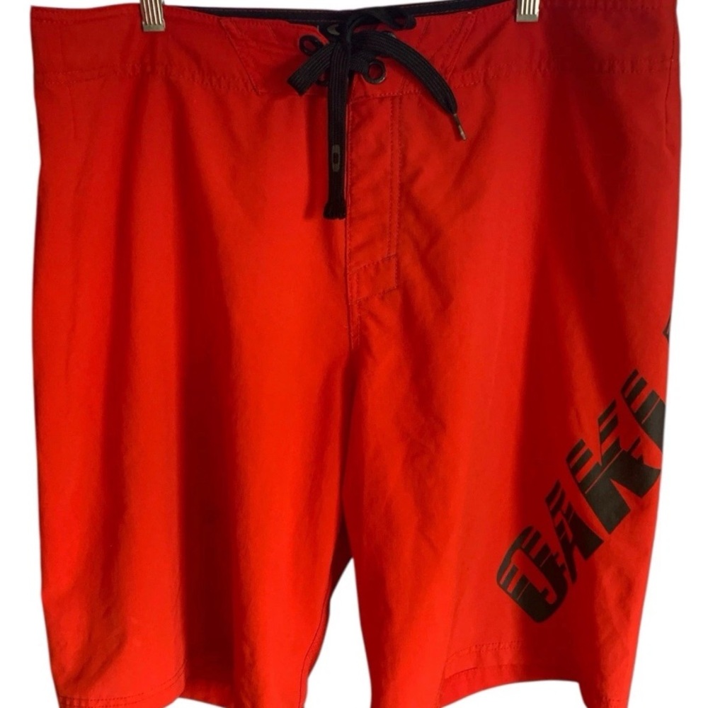Oakley Swim Trunks Men’s Red  38 Tie Front Flap Back Pocket Bungee Loop Shorts